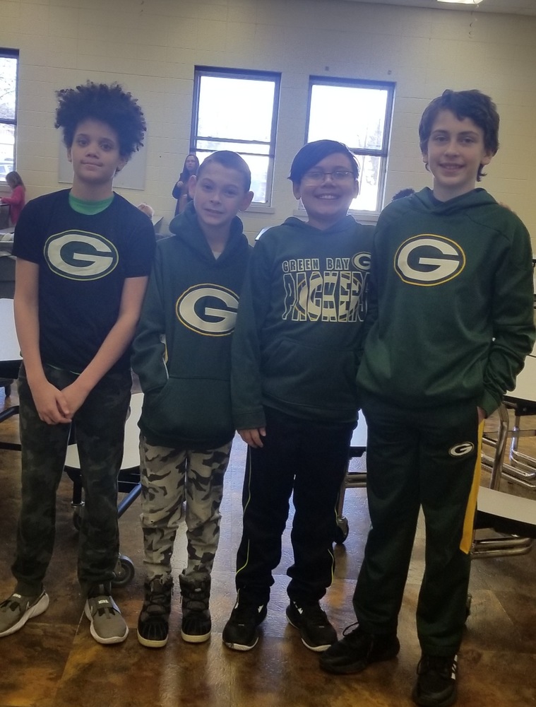 Students Post While Wearing Green Bay Packer Shirts