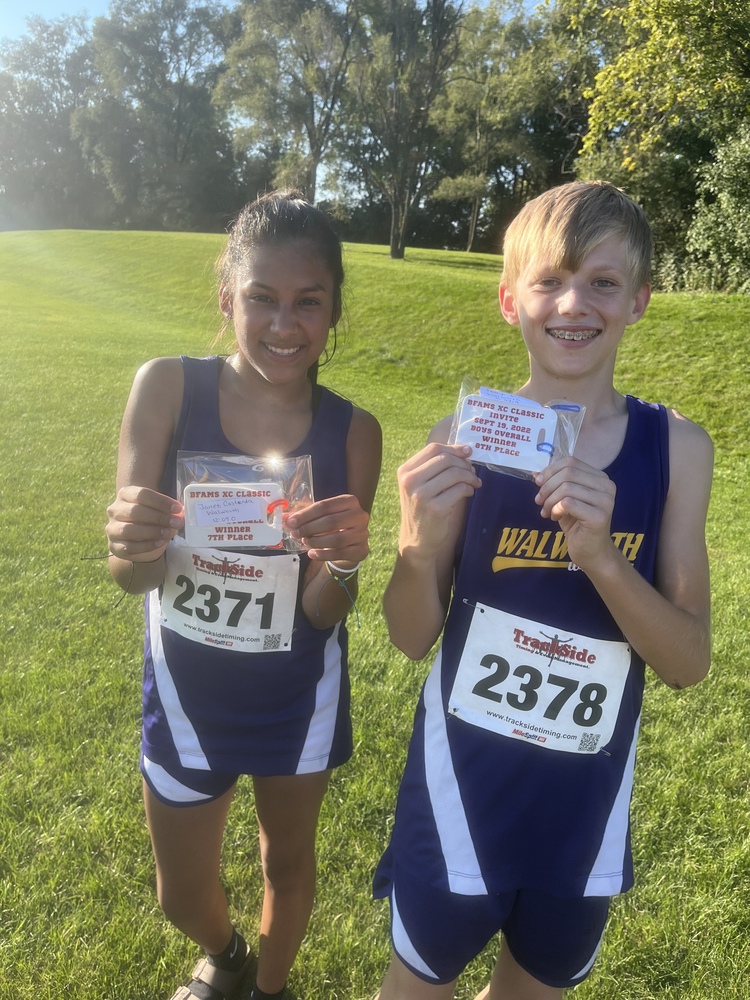 Cross Country Runners Hold Award