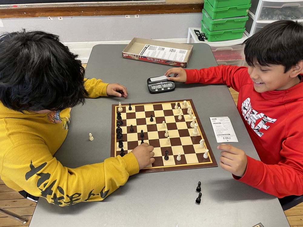 Two Students Play Chess